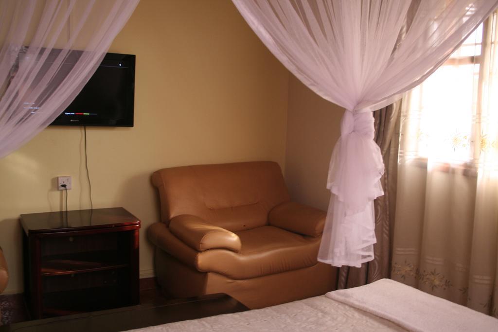 Hotel Acacia Кампала Номер фото